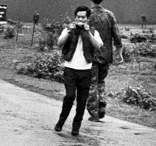 Nguyen Thanh Nghe – “Identified by his short sleeve white shirt and dark vest. He’s not carrying any bags and holds one camera around his neck” – from the AP report. © Bettmann via Getty Images Nguyen Thanh Nghe – “Identified by his short sleeve white shirt and dark vest. He’s not carrying any bags and holds one camera around his neck” – from the AP report. © Bettmann via Getty Images