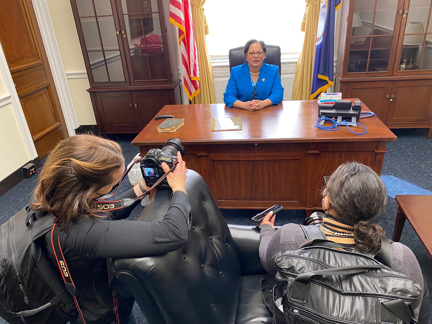 Rep. Jennifer McClellan siting at a desk