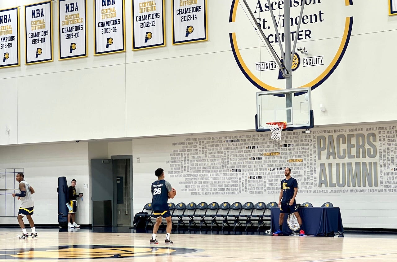 Ben Sheppard shooting with assistant Jannero Pargo.Ben Sheppard shoots after practice with player development coach Jannero Pargo.