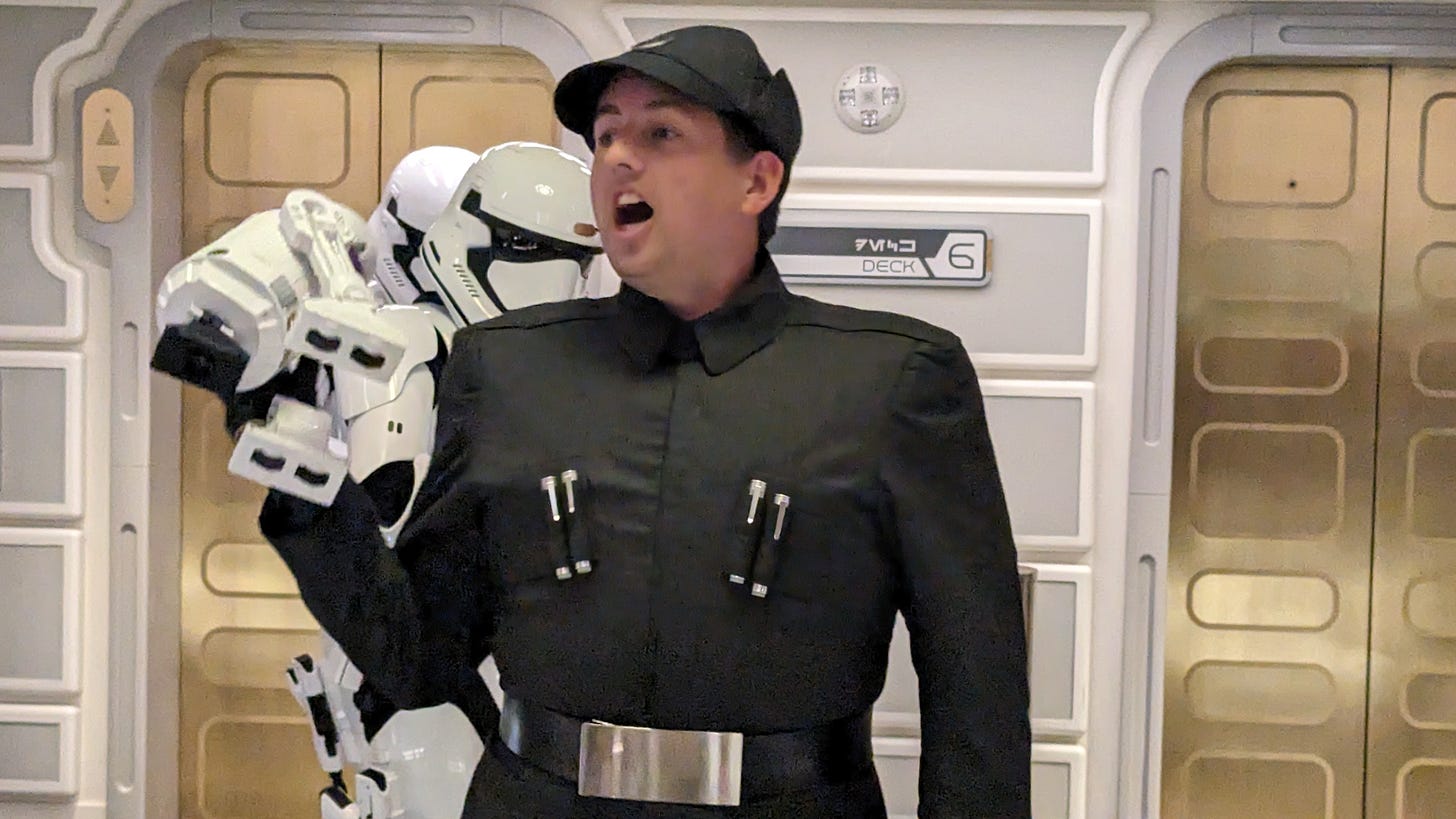 Lieutenant Croy committing theft, backed up by his stormtroopers