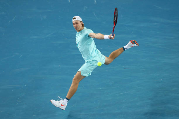 Denis Shapovalov of Canada plays a backhand during his Men's Singles first round match against Jannik Sinner of Italy during day one of the 2021...