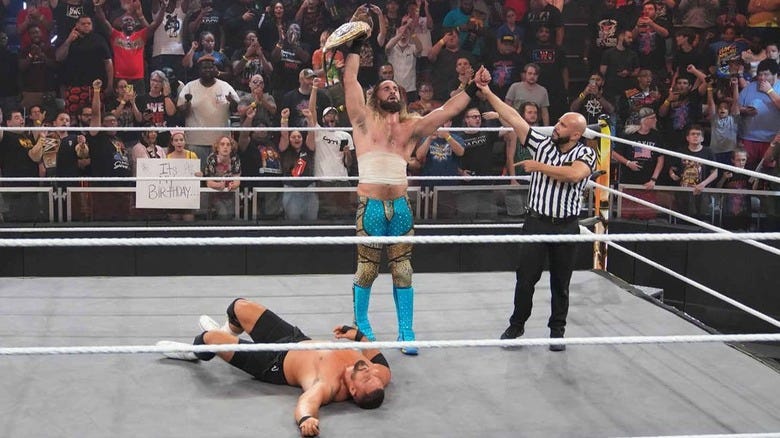 Seth Rollins celebrating his win on WWE NXT