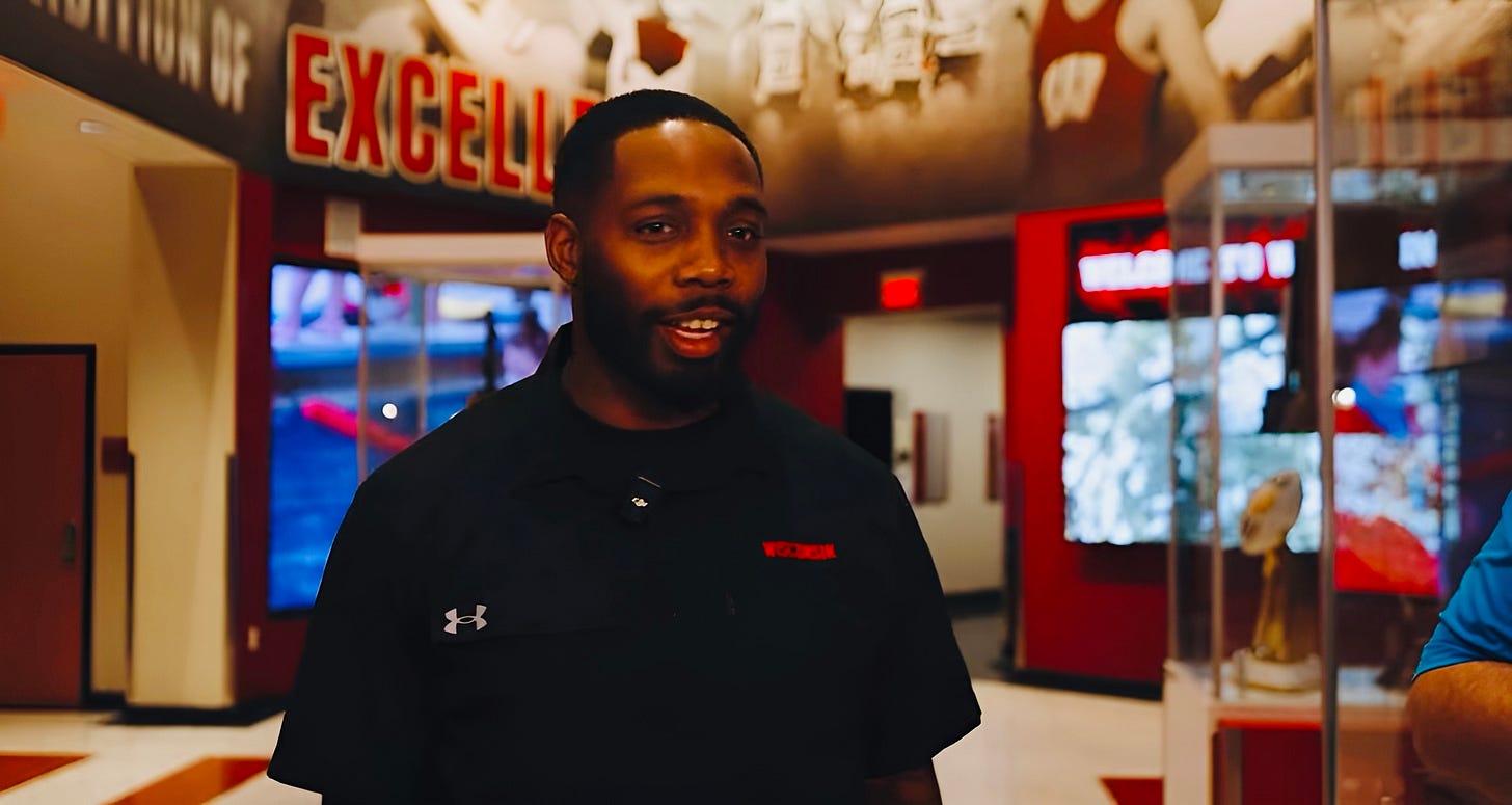 Wisconsin Badgers quarterbacks coach Kenny Guiton speaks to the media