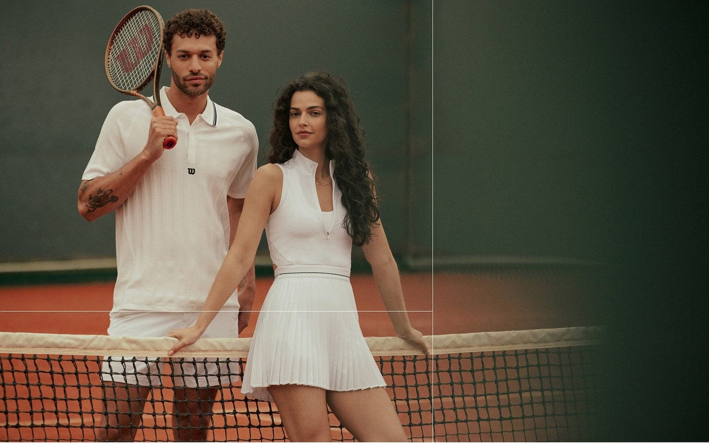 Man and woman playing tennis