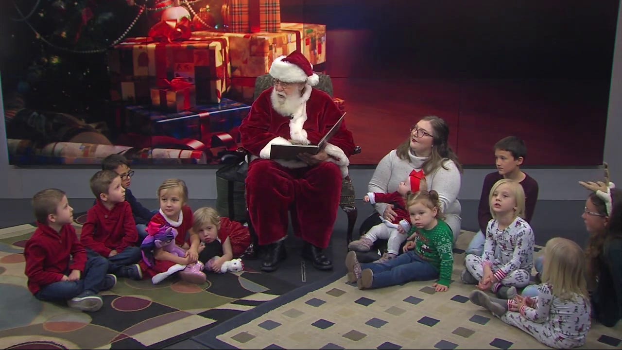 Santa Claus reads A Visit from Saint Nicholas