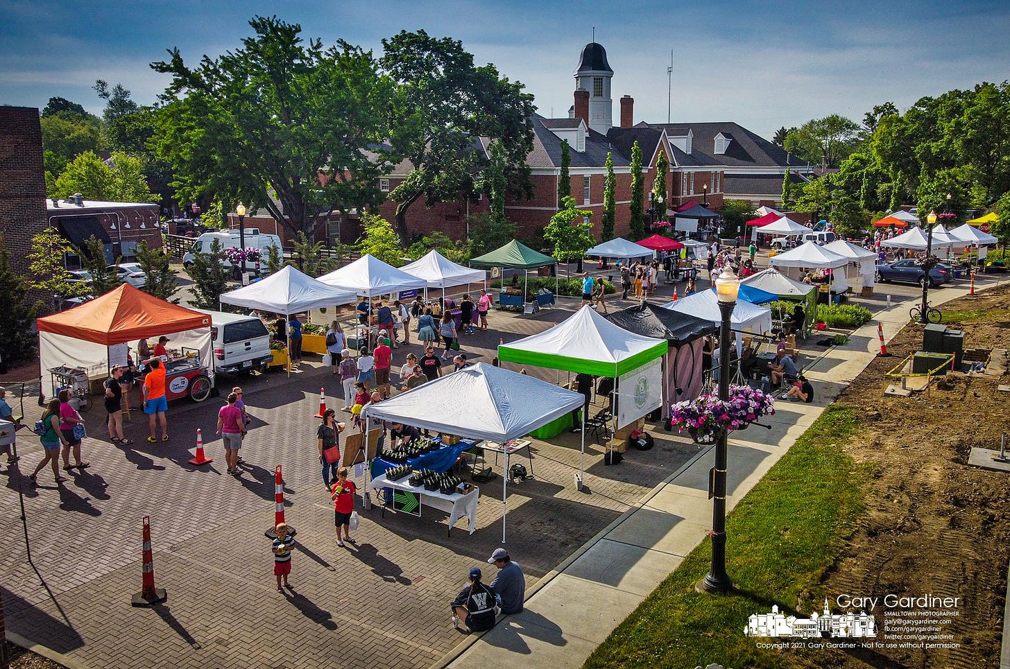The first Saturday Farmers Market opened behind city hall to warm temperatures, a large number of vendors, and a crowd eager to see the market begin another year of summer treats. My Final Photo for May 22, 2021.
