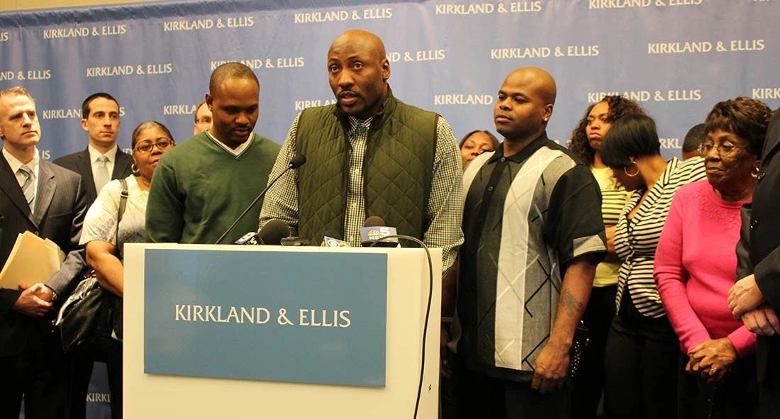 Lashawn Ezell, Larod Styles and Charles Johnson stand with family and legal team to speak about their exoneration in 2017