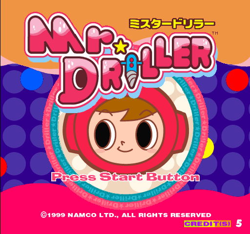 A screenshot of the title screen for the arcade version of Mr. Driller, which features the face of the titular "Mr. Driller, Susumu Hori, as well as the game's logo. Everything is bright and colorful, as is the entire rest of the game, which might be a surprise considering it's all about digging deep underground.