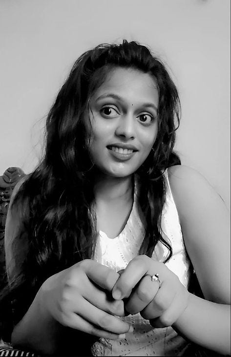 Black and white photo of the author, Neelima Sankar.