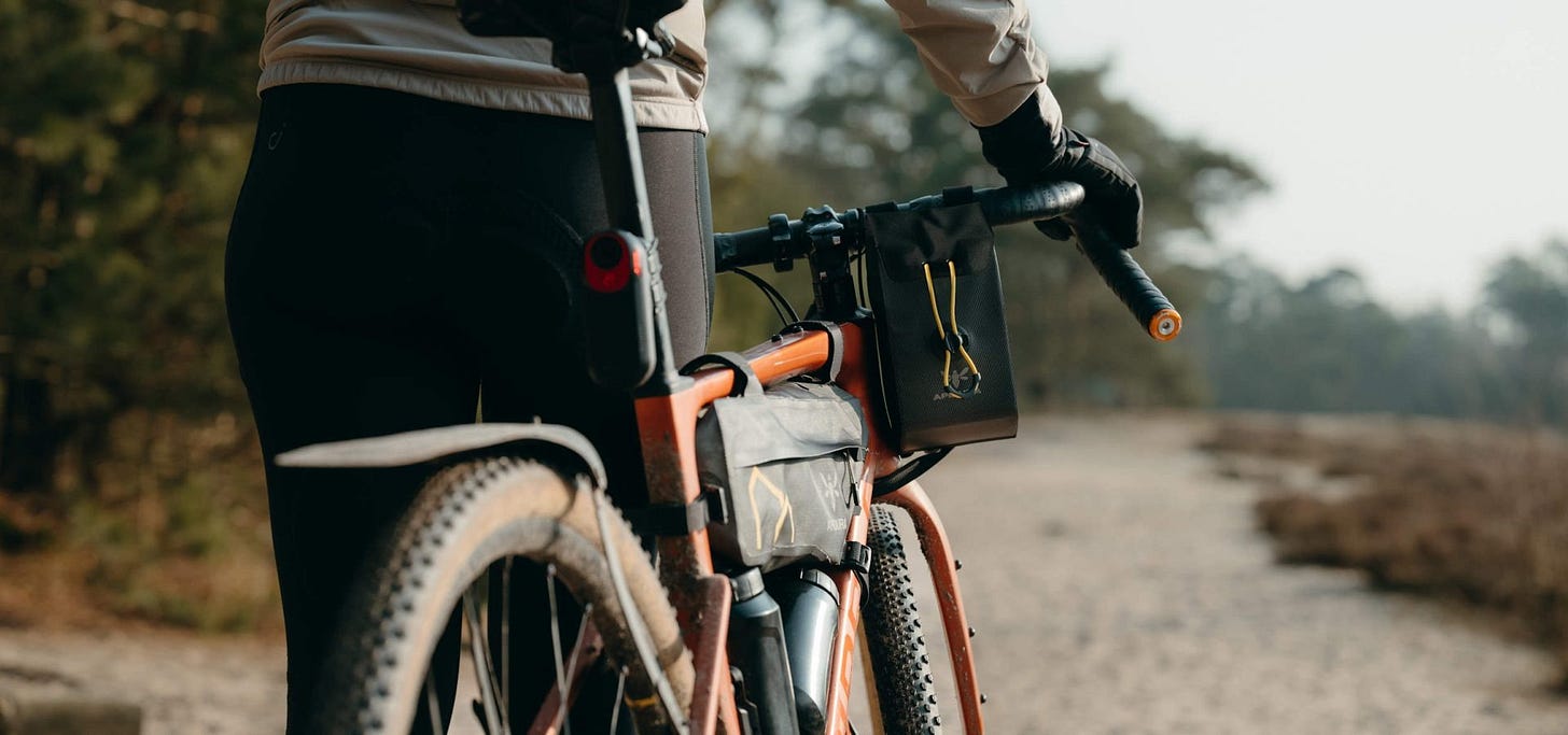 Rider with bike with Expedition Stem Pack