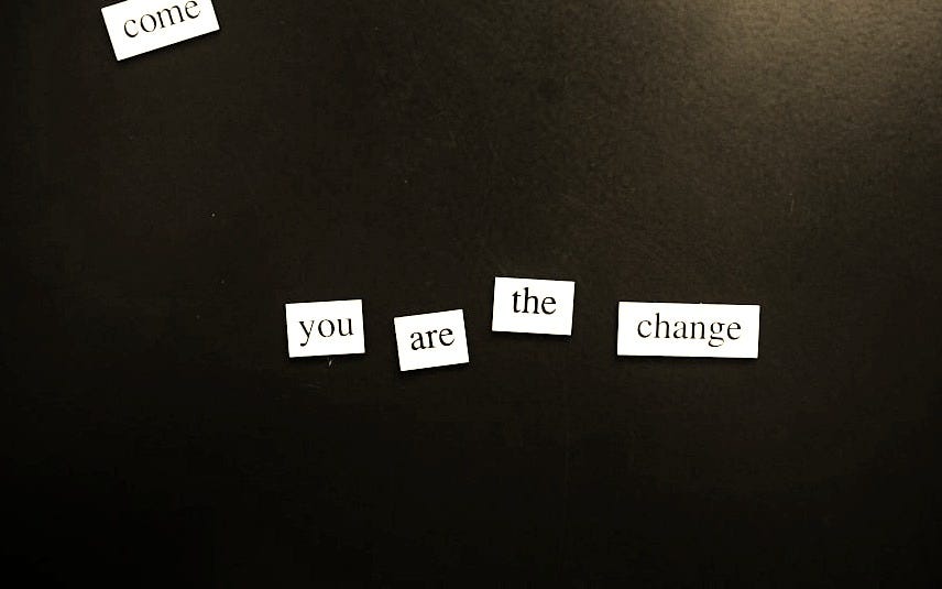 a refrigerator door with magnets that say come, the change, and come