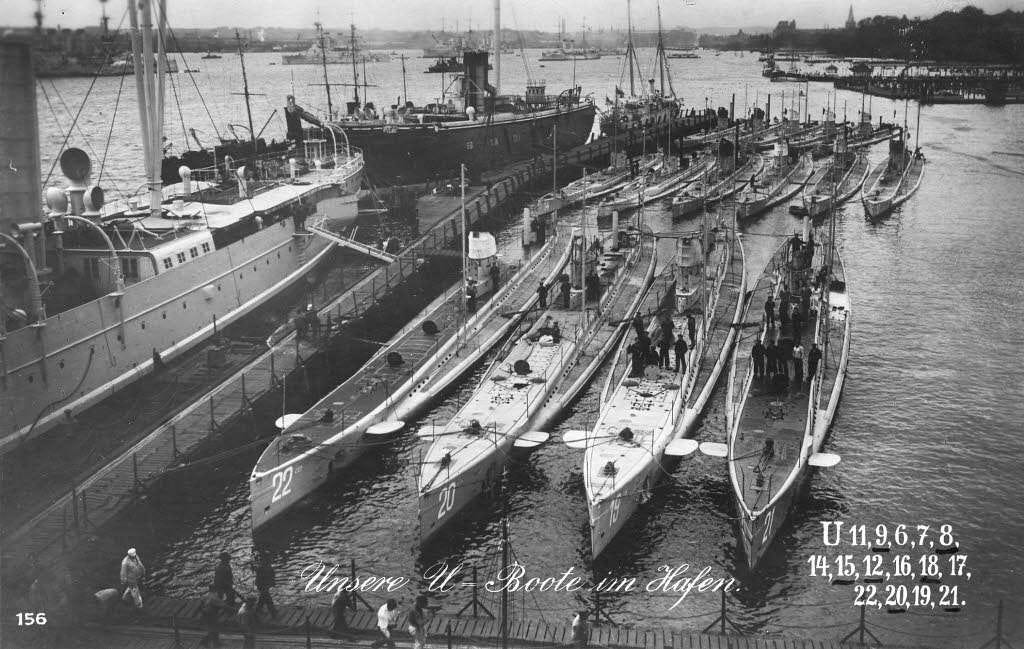 Photo showing 15 German U-boats tied up together in their doc. The photo is from 1914.
