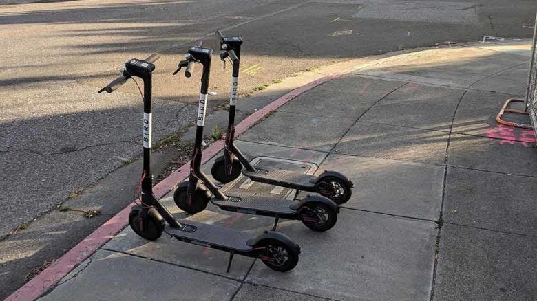 Bird electric share scooters on the footpath in San Jose, California.