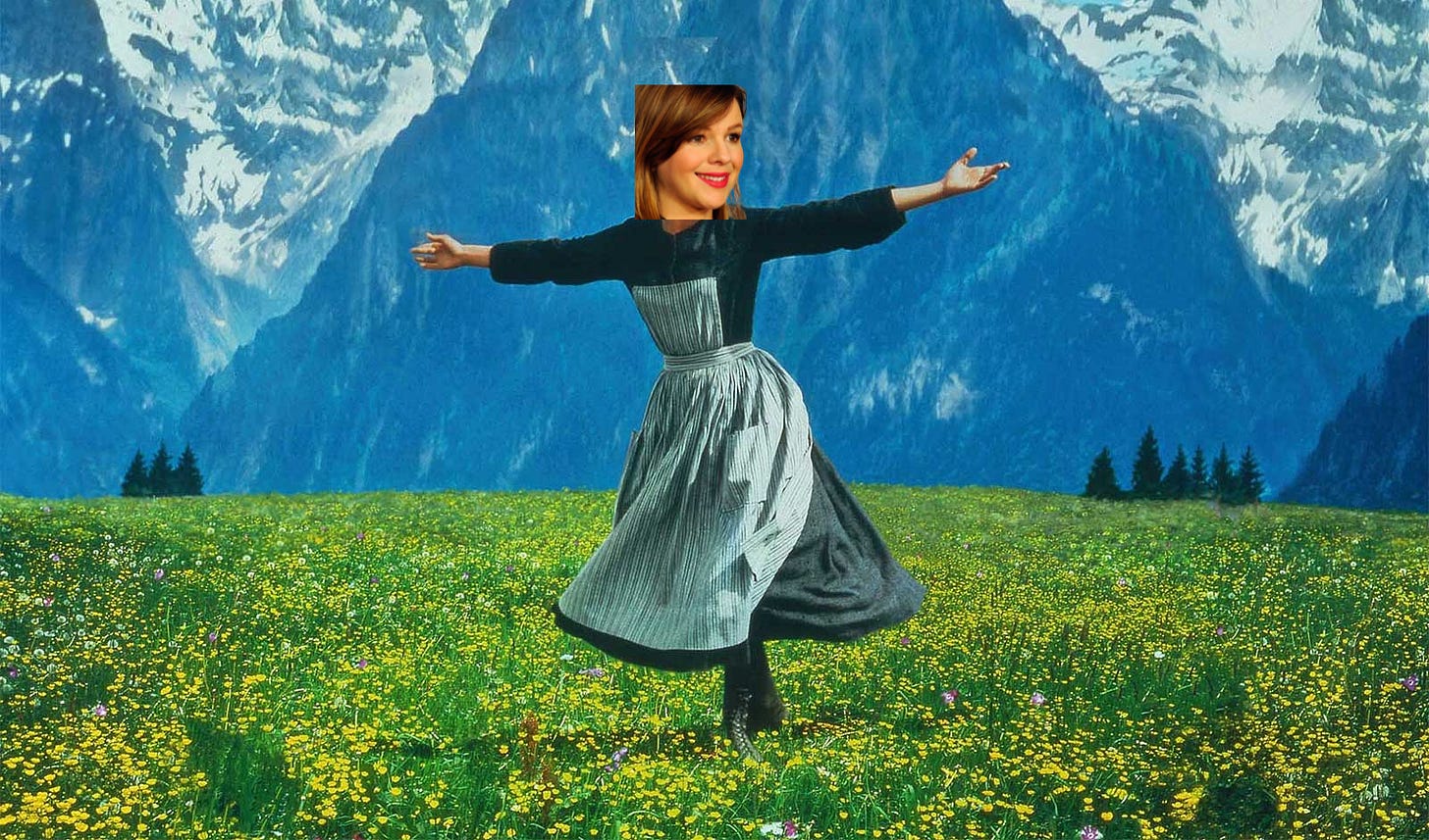 A still from the movie "The Sound of Music" where Julie Andrews is singing and dancing in a field. The image has been poorly and obviously edited to try to make it look like it is Amber singing and dancing in the field. 