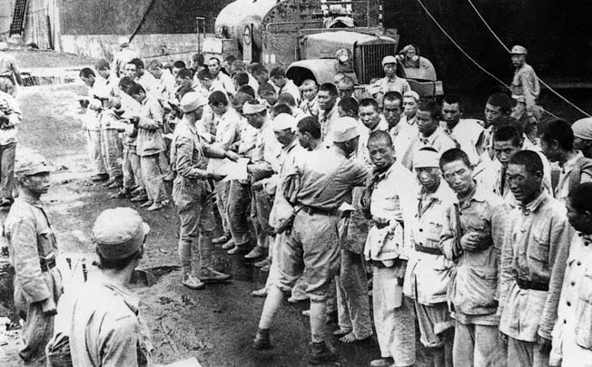 With their backs to the wall, Chinese Nationalists prepared a last-ditch defense of the strategic island of Kinsmen.