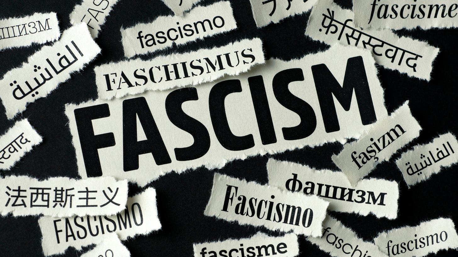 The word fascism spelled in different languages on scattered scraps of paper