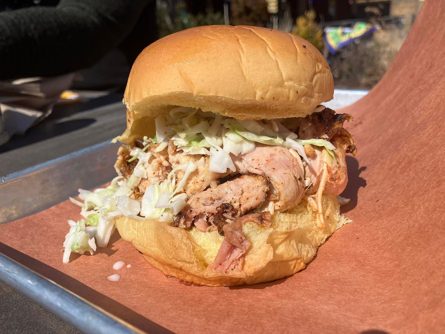 May be an image of chicken sandwich