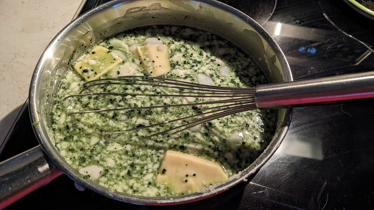 a pot of matcha ice cream base on the stove