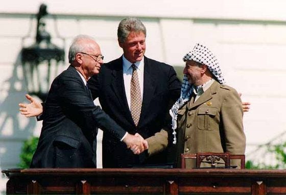 Bill Clinton, Yitzhak Rabin, Yasser Arafat at the White House, September 13,  1993, photo by Vince Musi via Wikimedia Commons - Begin-Sadat Center for  Strategic Studies