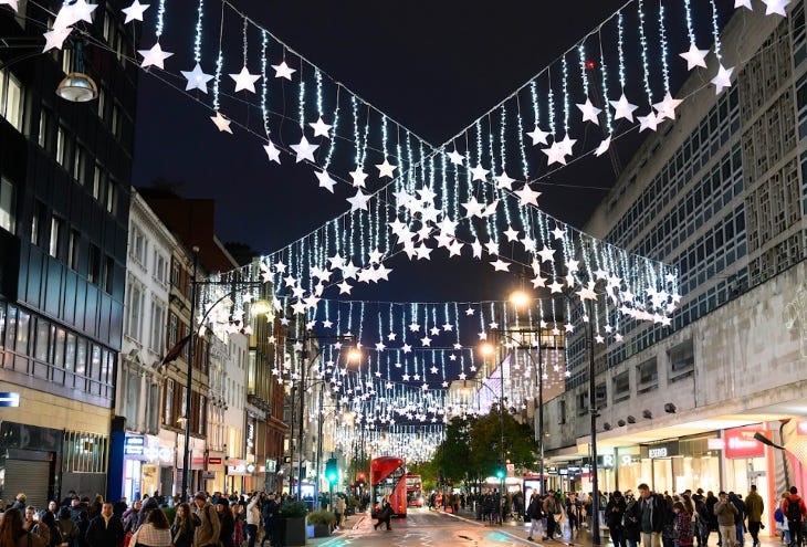 Oxford Street Christmas lights: glowing white stars criss-crossing above Oxford Street