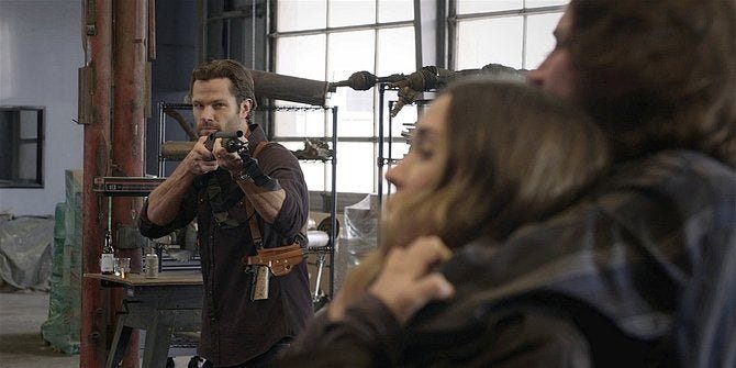 Walker Jared Padalecki pointing rifle at Oswald.