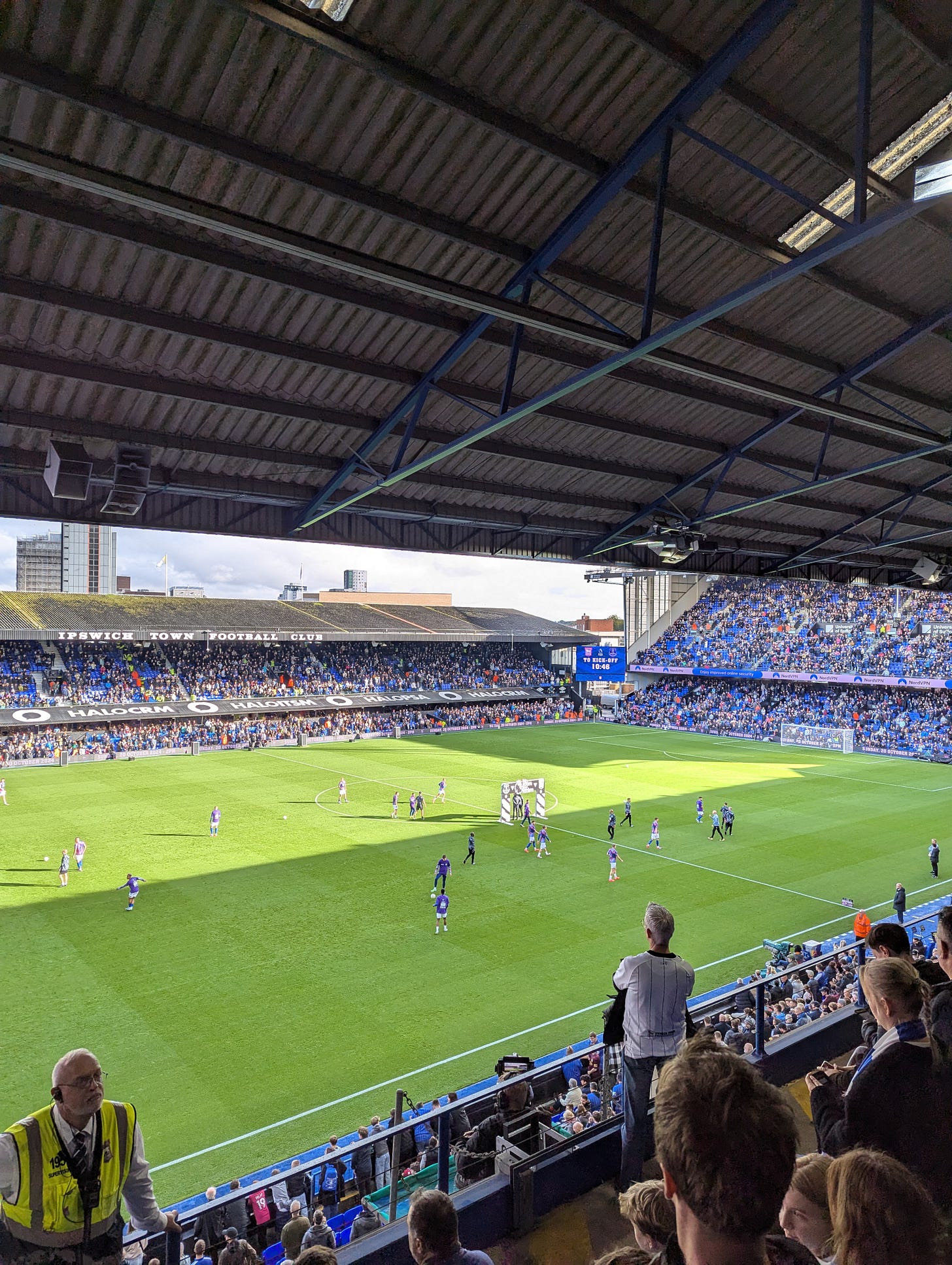 Ipswich players warm up before kick off, photo from the West Stand