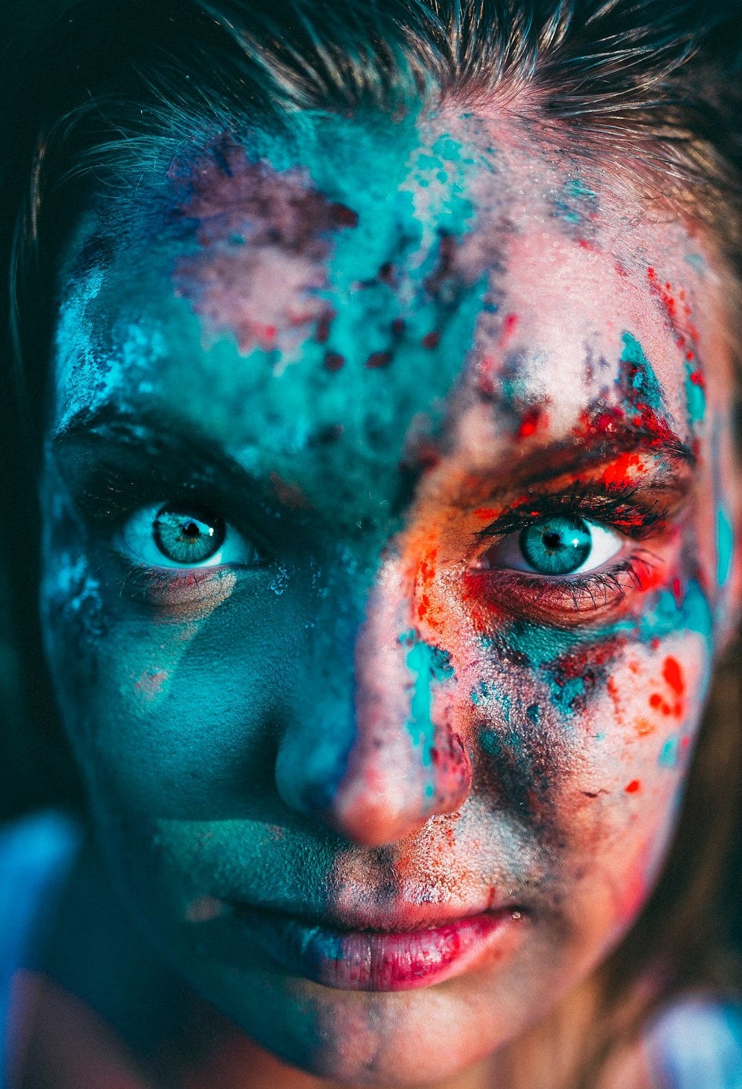 portrait photography of woman with face paint