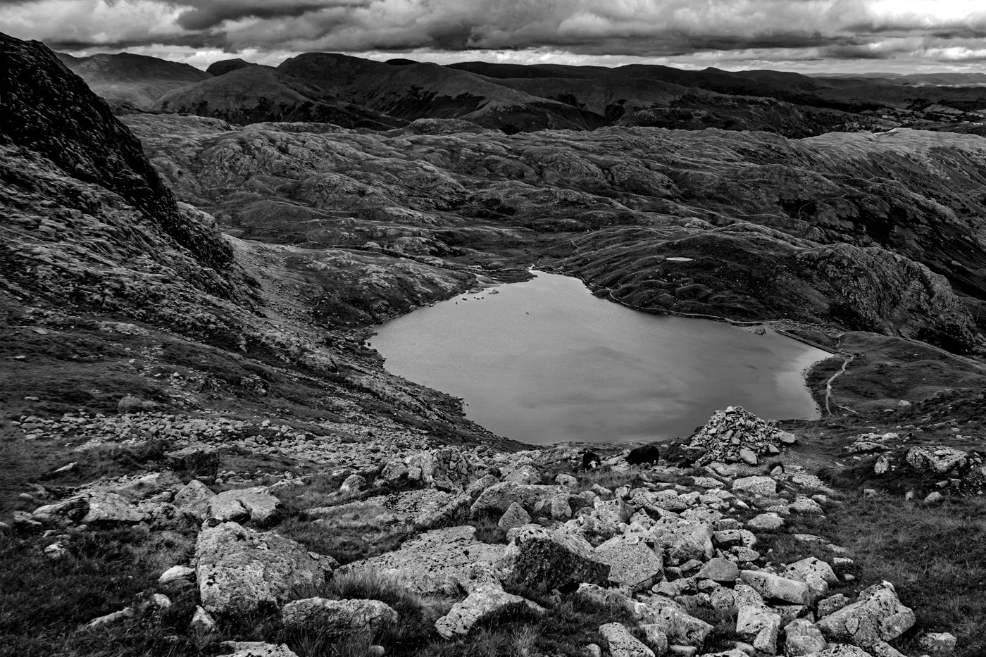 A lake in a valley

Description automatically generated