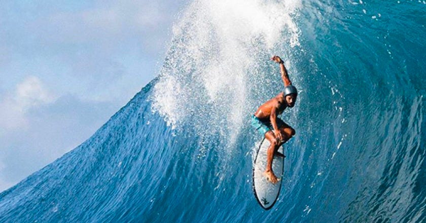 A man surfing 