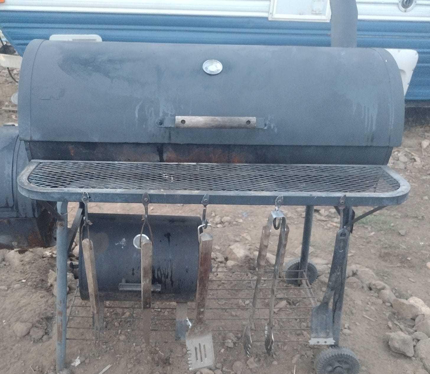 The restored barbecue, now looking serviceable (if not respectable).