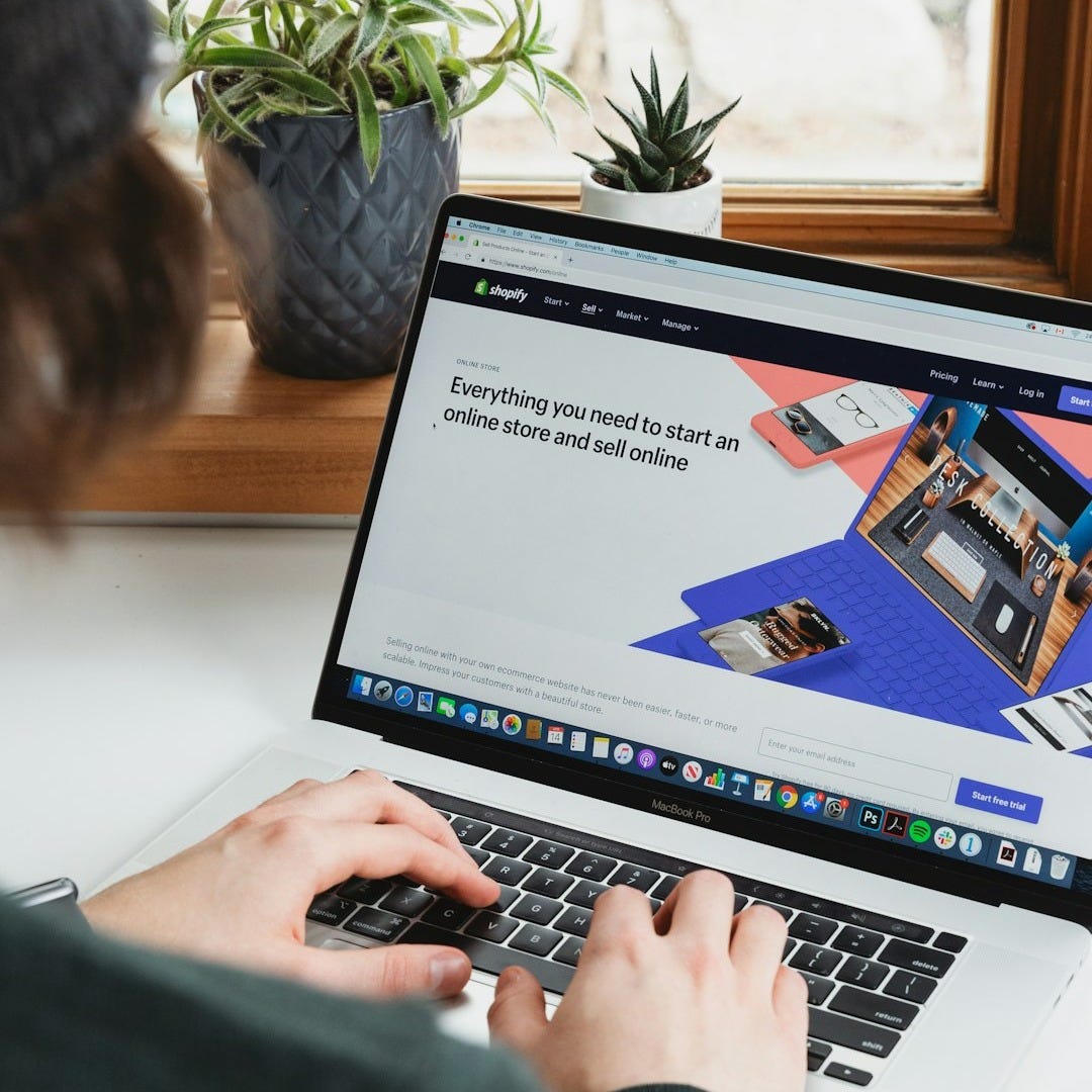 person building a website to have online presence