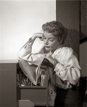 Vintage photo tired woman Stock Photos - Page 1 : Masterfile