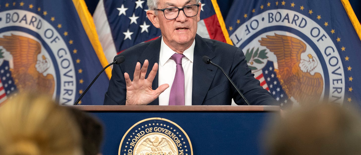 Jerome Powell responds to questions on rising inflation and Fed interest rate policies.