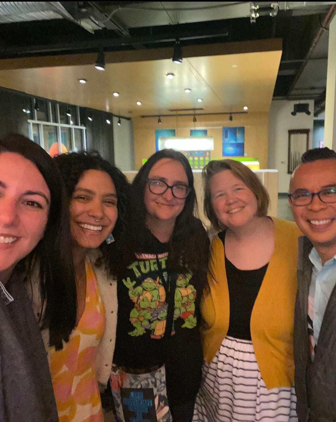 Selfie taken by Jo Segura of Jo Segura, Rachel Runya Katz, Alicia Thompson, Anita Kelly, and Dominic Lim in the lobby of the hotel