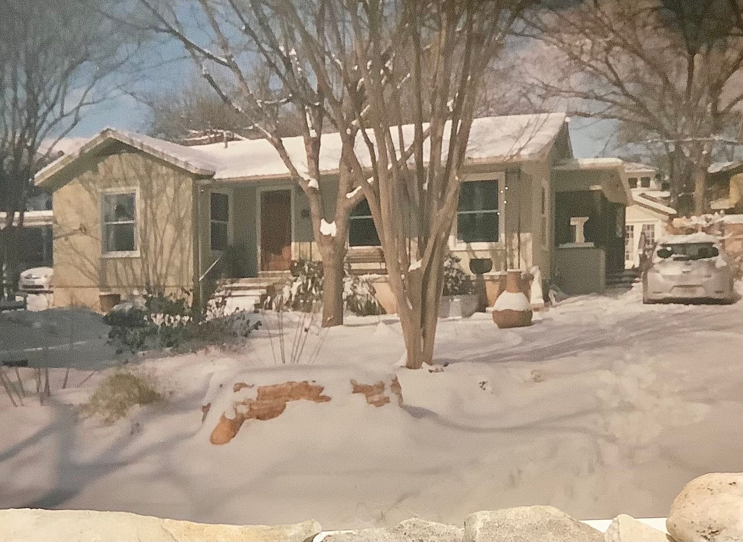 Snowfall scene with cute house