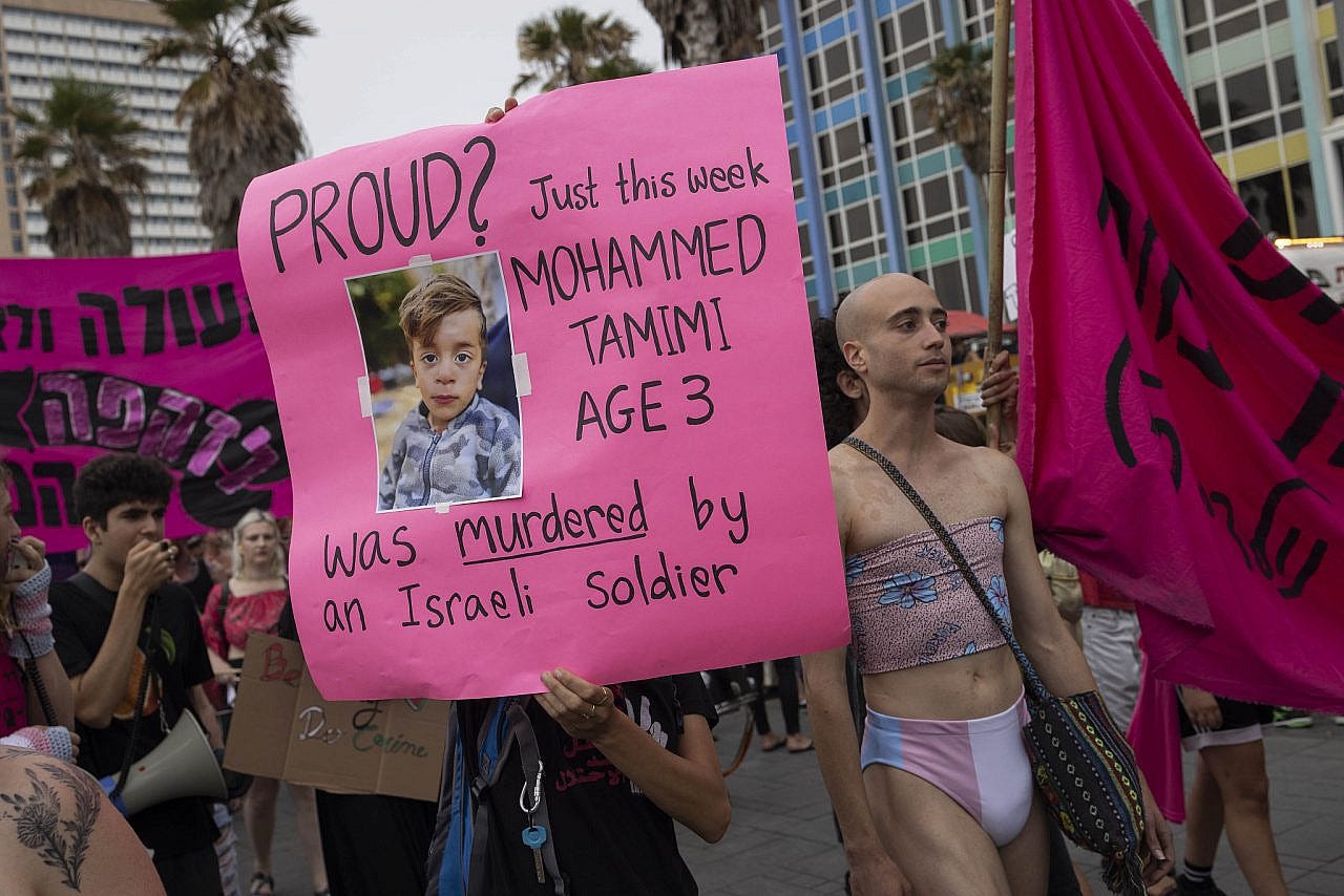 Activists take part in the anti-pinkwashing bloc during the Tel Aviv Pride Parade, June 8, 2023. (Oren Ziv) Activists take part in the anti-pinkwashing bloc during the Tel Aviv Pride Parade, June 8, 2023. (Oren Ziv)