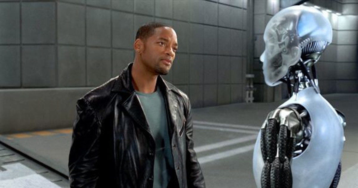 cena do filme Eu Robô com Will Smith discutindo inteligência artificial com um robô, escrito por Isaac Asimov.