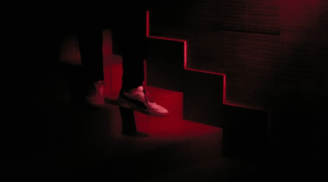 red and black stairs with red lights red and black stairs with red lights