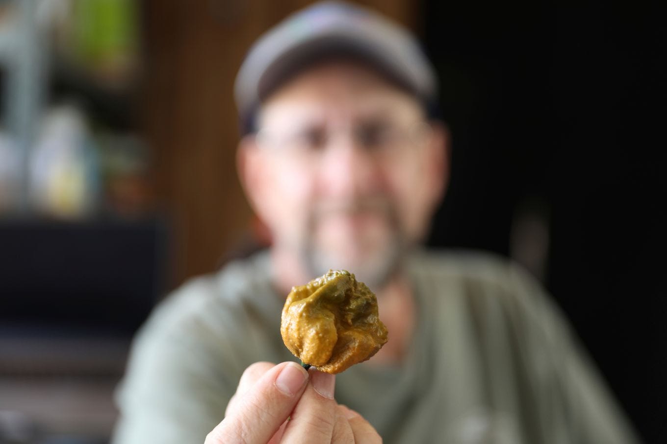 Ed Currie holds his creation, the Pepper X. (Jeffrey Collins/AP)
