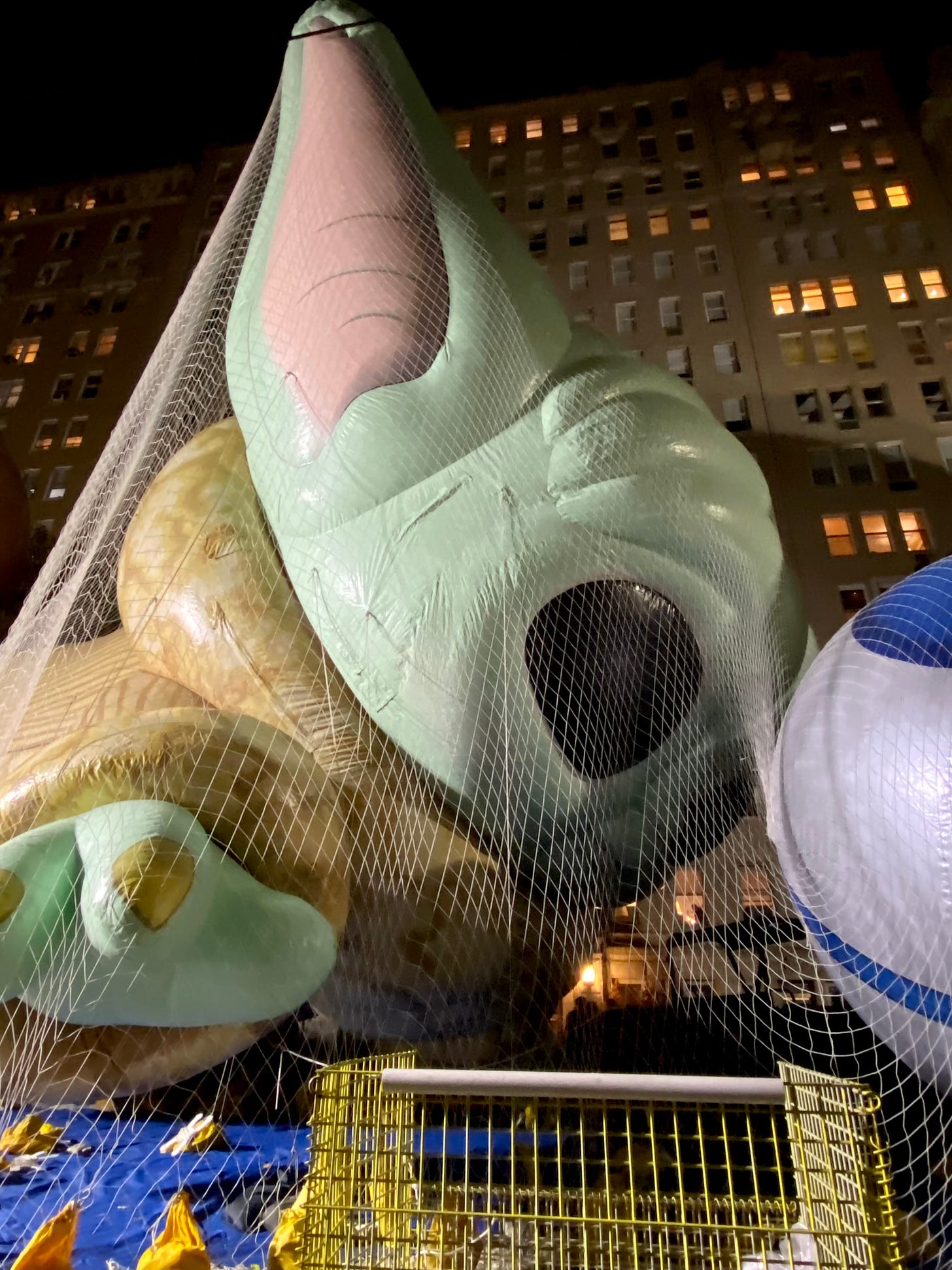 A Grogu balloon, netted down the night before the Macy's Thanksgiving Day Parade.