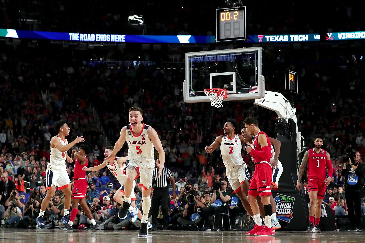 MINNEAPOLIS, MINNESOTA - APRIL 08:  Kyle Guy #5 of the Virginia Cavaliers celebrates his teams 85-77 win over the Texas Tech Red Raiders to win the the 2019 NCAA men's Final Four National Championship game at U.S. Bank Stadium on April 08, 2019 in Minneapolis, Minnesota. (Photo by Streeter Lecka/Getty Images)