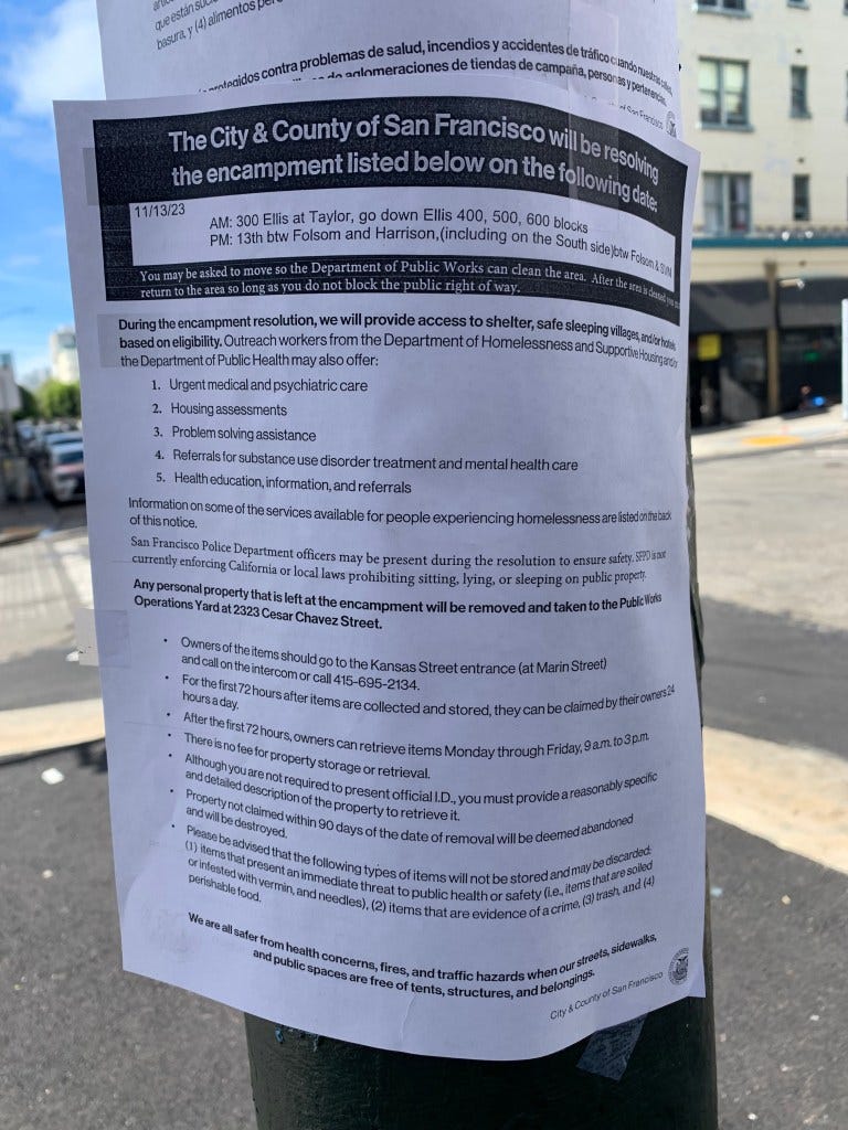 A sign is posted by the city about cleaning up the area of homeless encampment in the Tenderloin District in San Francisco, California on Friday, November 10, 2023. The city of San Francisco is trying to clean up various areas of the city before the APEC Conference comes to town November 11-17, 2023.