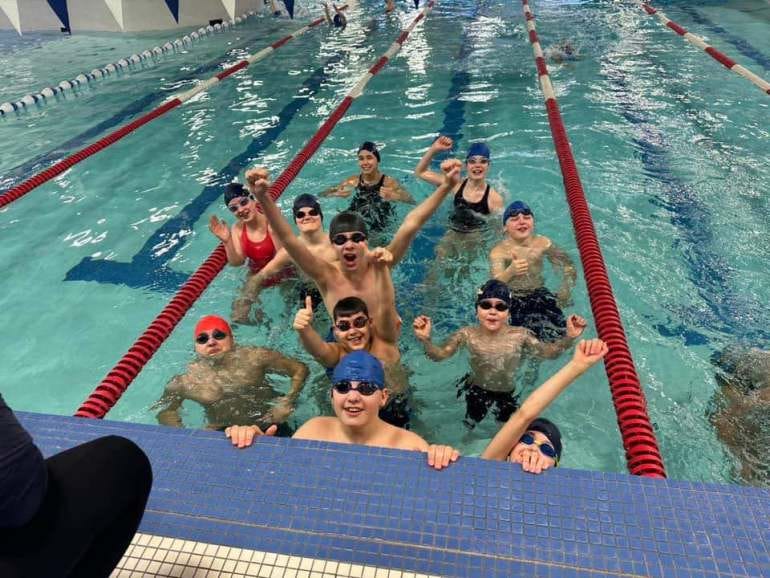 Hay River Swim Club members at a Yellowknife event in February. Photo: Julie Malenfant