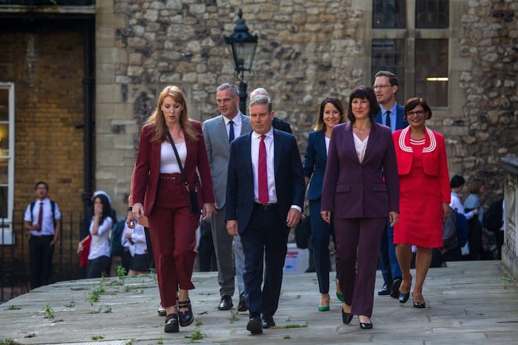 The shadow Labour cabinet walking outside