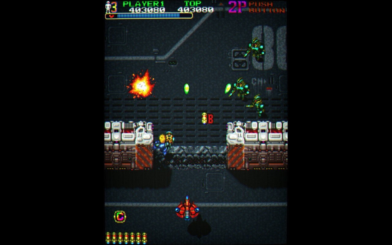 A screenshot from Out Zone featuring not just the player character defeating robosoldiers, but the ship from Truxton is here lending a hand, too.