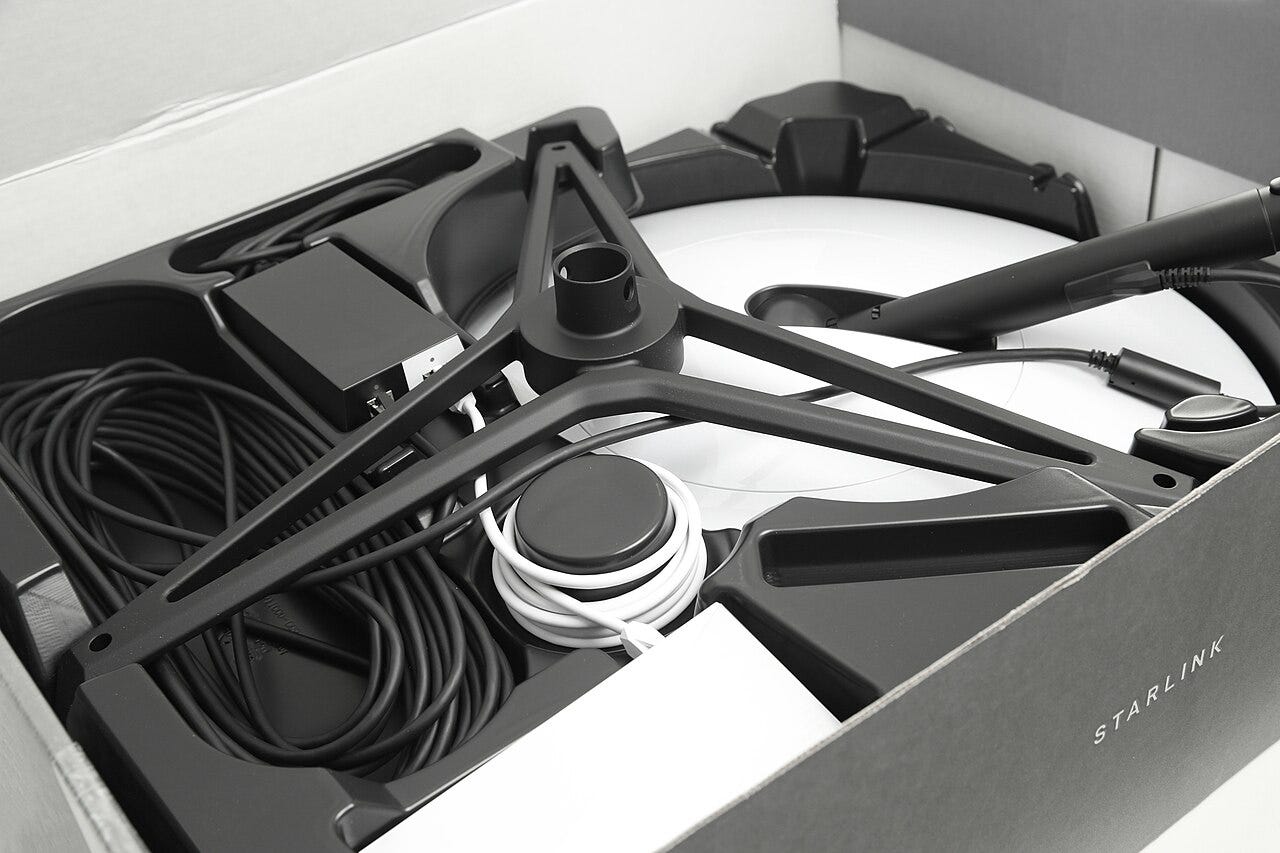 Early Starlink user terminal with dish, as shipped in early 2021