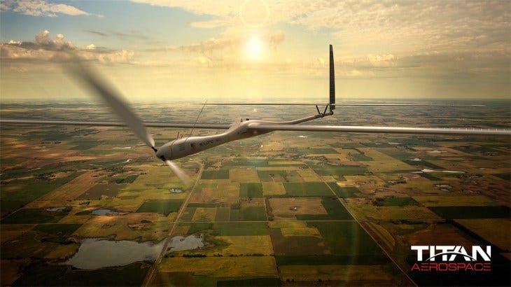 A Titan Aerospace image showing a drone flying high above fields of farms