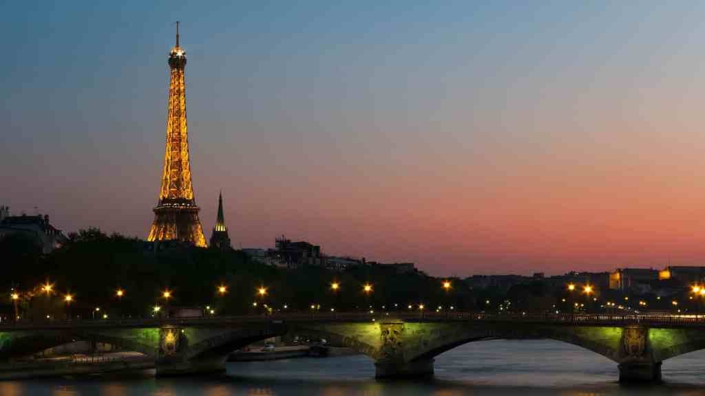 photo of eiffel tower with lights