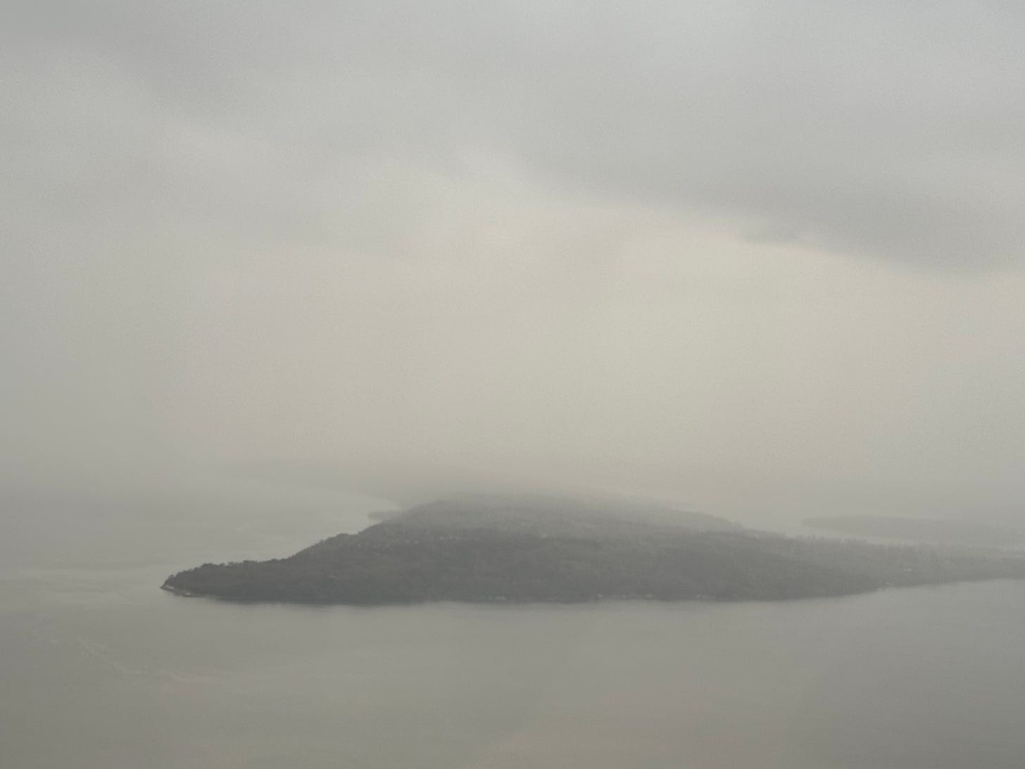 Pacific Northwest island shrouded in mist