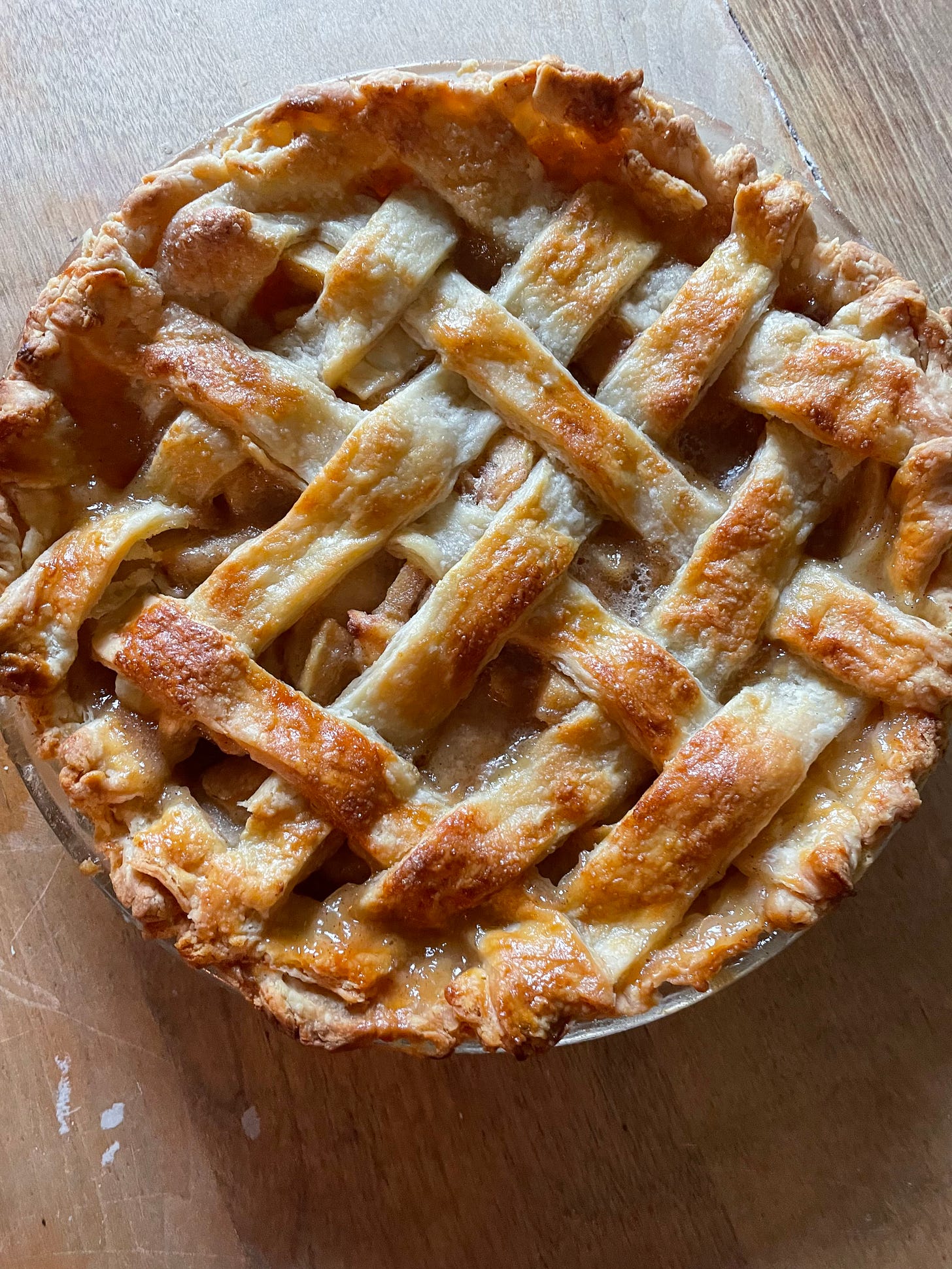 a golden pie with a lattice crust